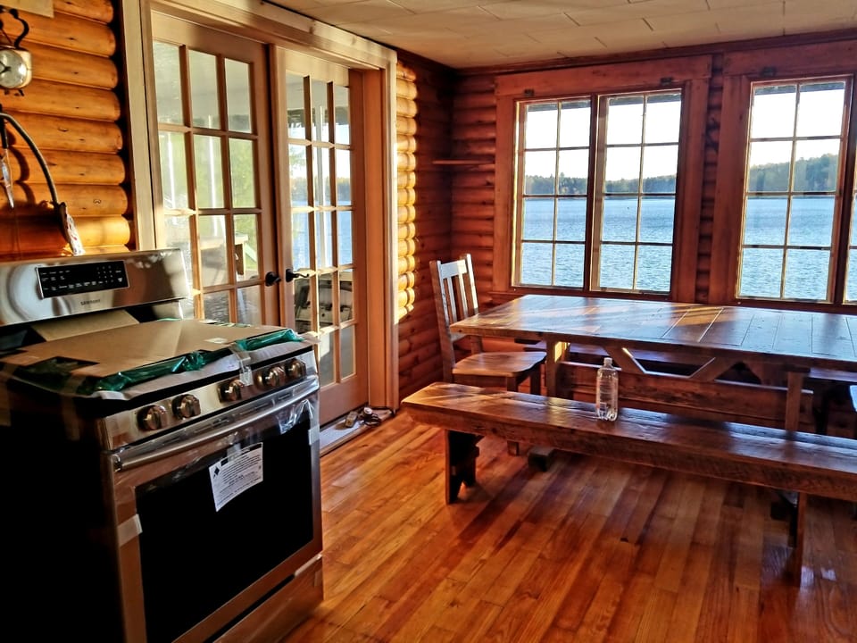 Kitchen with the Amish Barn Wood Farm-style Table seating 8-10 people