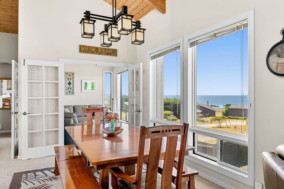 dining area in the open floor plan of the upper floor.