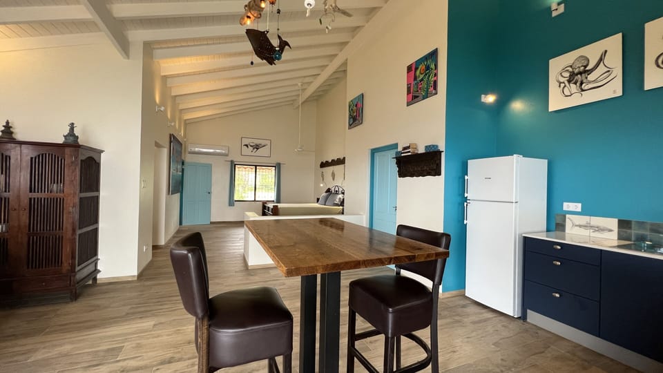 High top table for food prep or dining.