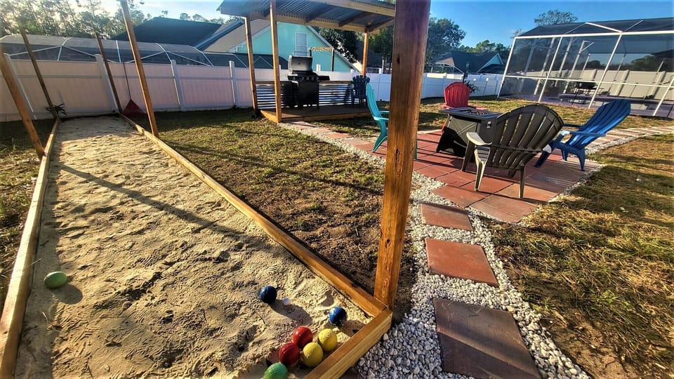 Childerns play area in back yard of the house