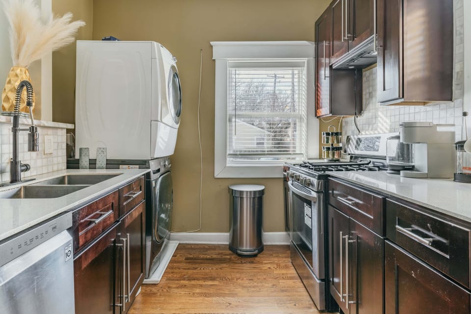 Galley kitchen and nice kitchen window

