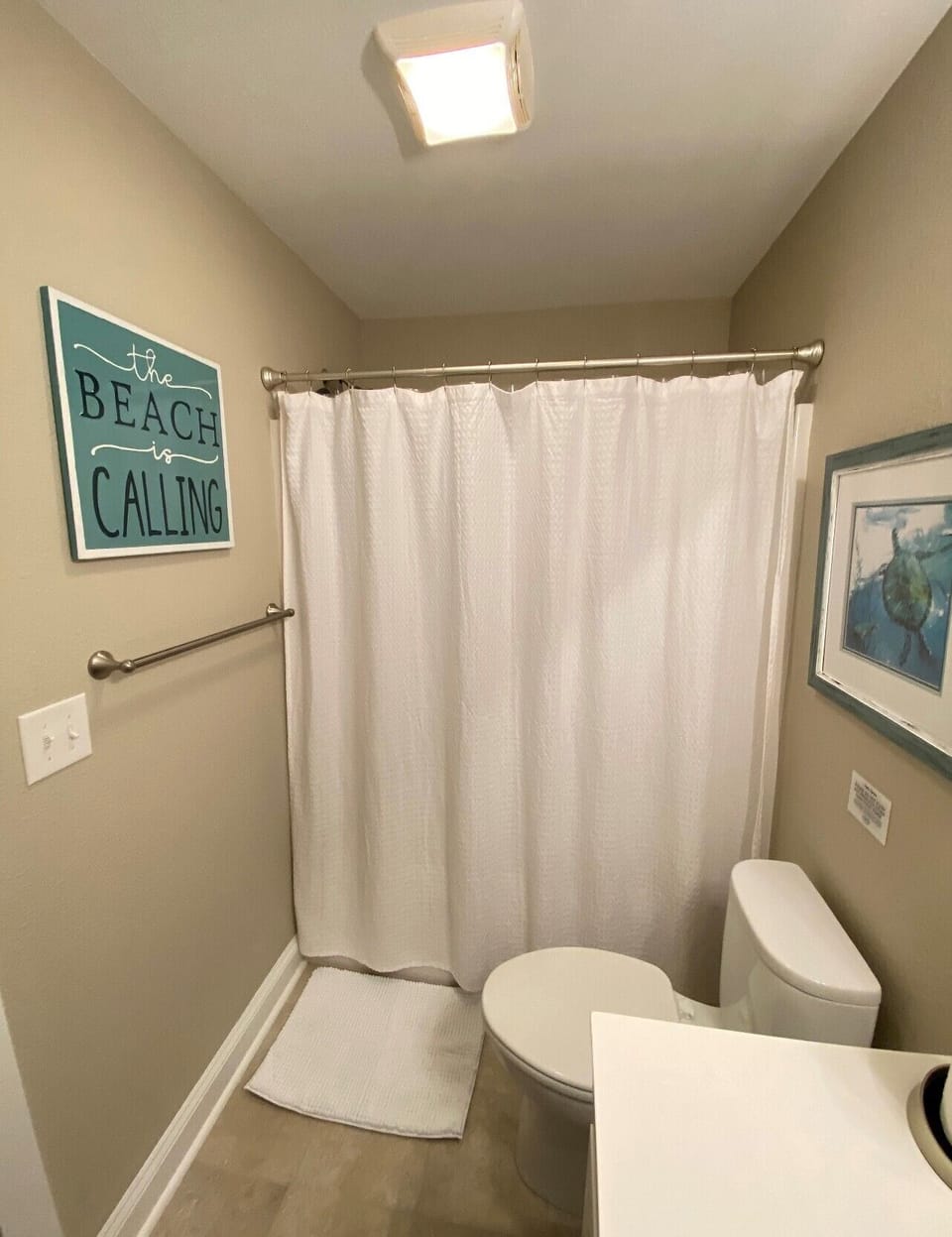 Full bathroom with shower and tub
