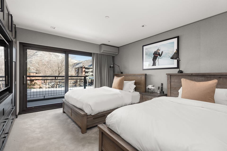 Guest Bedroom 1: With 2 Full Size Beds, Balcony and Smart TV