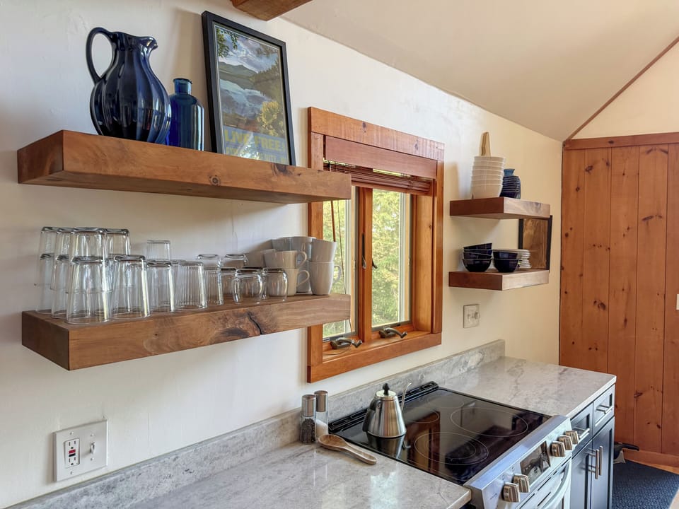 Aesthically pleasing and practical open shelving in the kitchen.