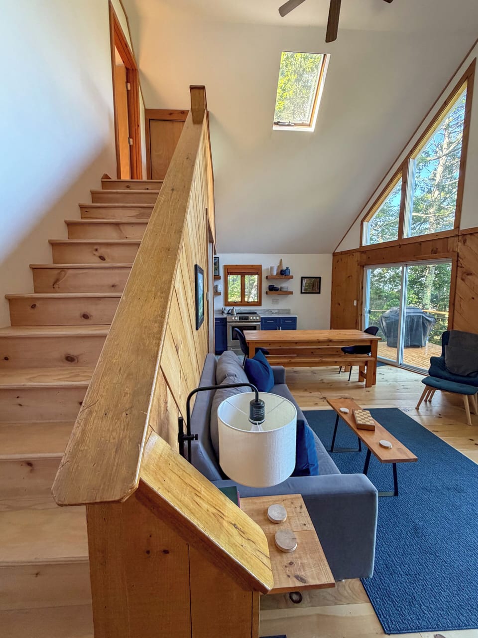 Kitchen flows to dining to living and then up to the loft.