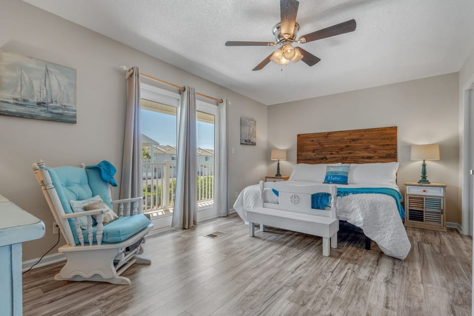 Master bedroom with a balcony