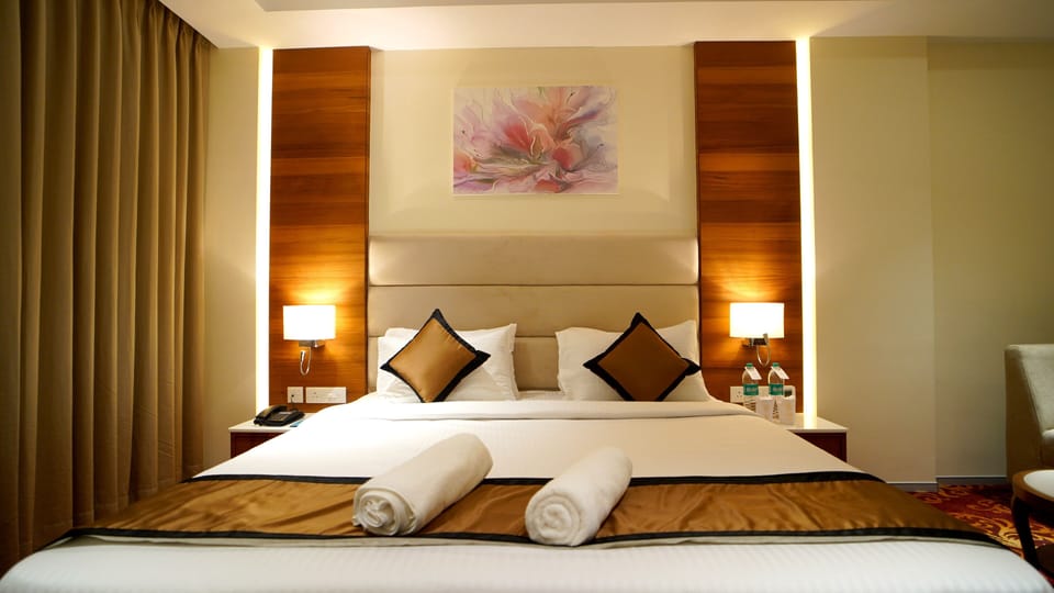 Premium Room with Garden View | Pillowtop beds, laptop workspace, soundproofing, free wired internet