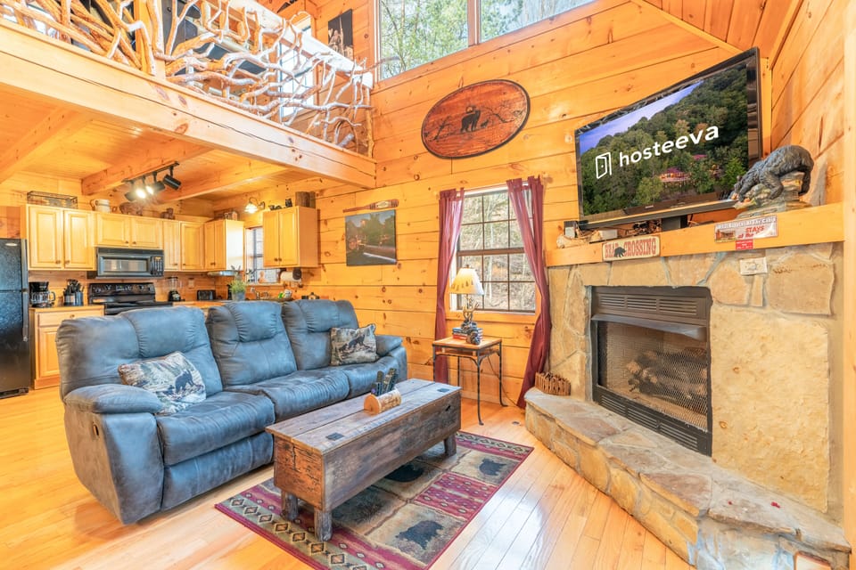 Family Cabin, 2 Bedrooms, Hot Tub, City View | Living room | 55-inch Smart TV with cable channels, TV, fireplace