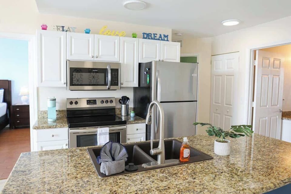 Full kitchen in our top floor, bay front view apartment in Boca Ciega Resort, St. Petersburg.