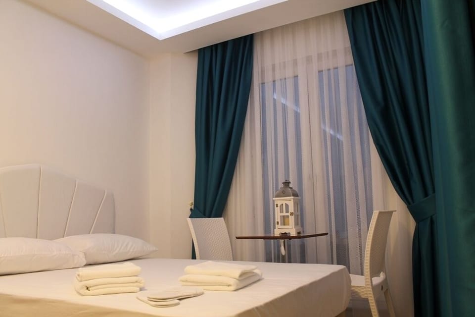 Standard Room, Beach View | Desk, free WiFi, bed sheets