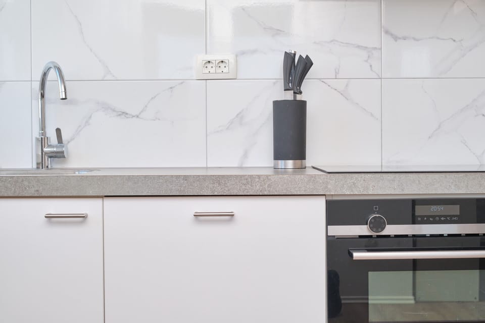 Apartment | Private kitchen | Full-size fridge, oven, stovetop, dishwasher