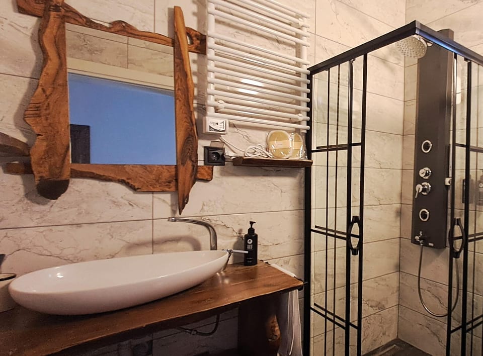 Eco-friendly toiletries, hair dryer, bathrobes, slippers