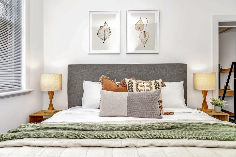 Luxury awaits: plush king bed for regal rest. Comfort and sophistication ensure a delightful stay.
