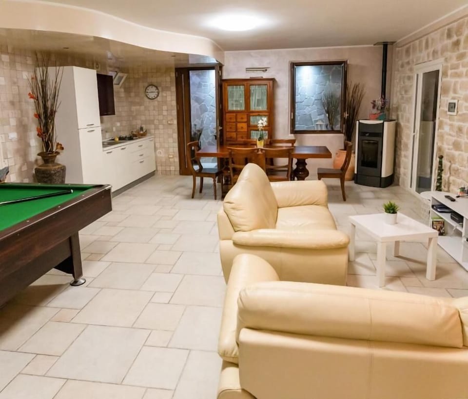 Villa | Living area | 24-inch flat-screen TV with digital channels, TV, DVD player