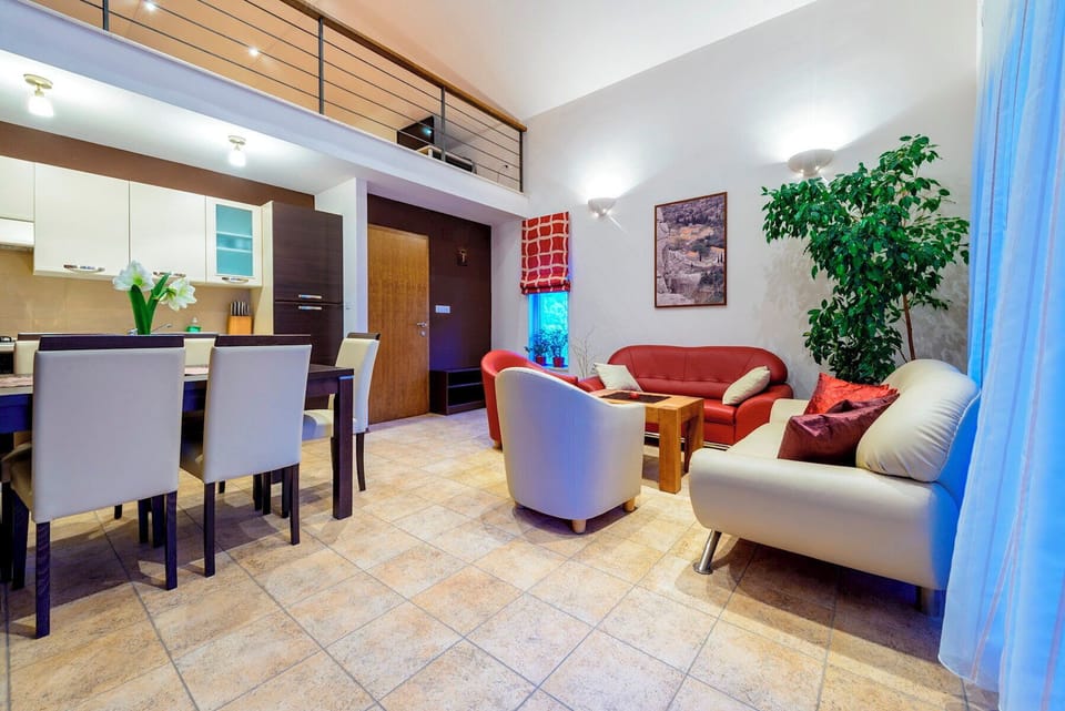 Open plan living room with kitchen and dining area
