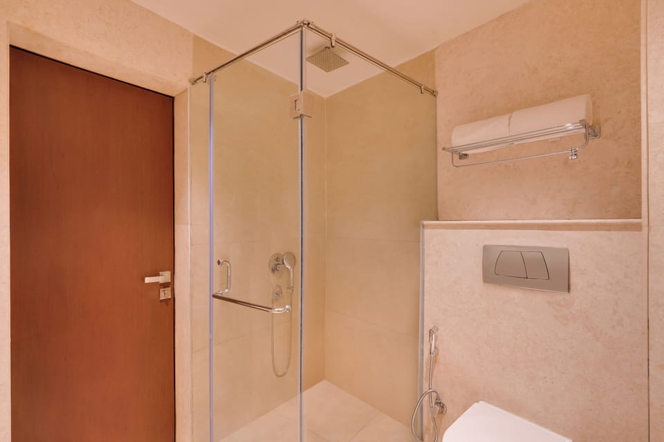 Shower, free toiletries, slippers, towels