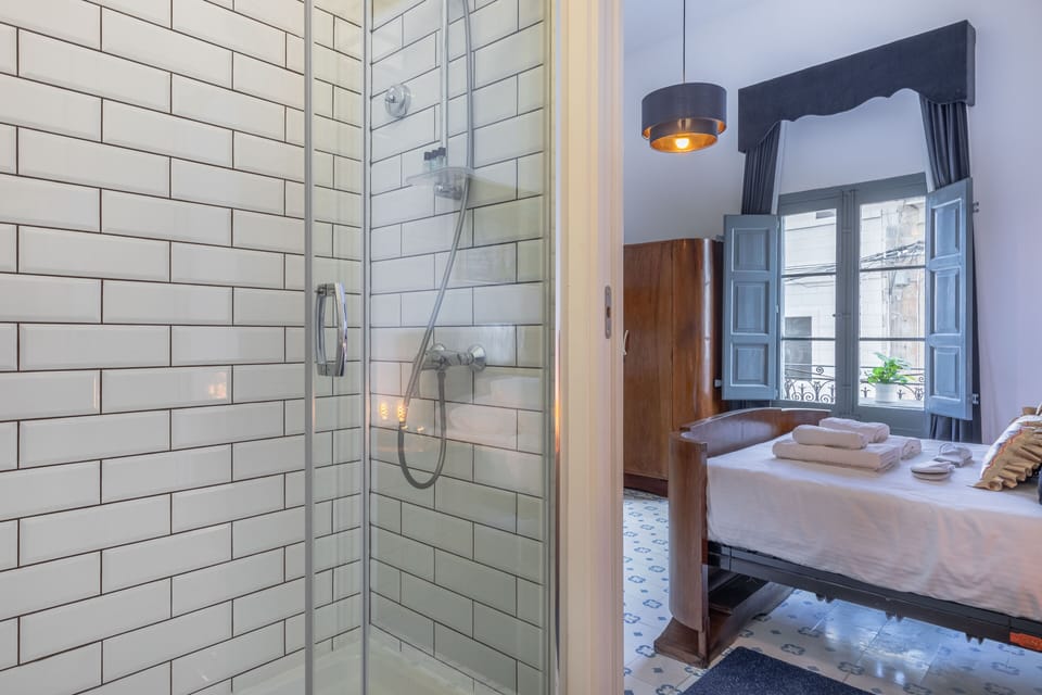 Deluxe Double Room | Bathroom | Shower, hair dryer, bathrobes, slippers