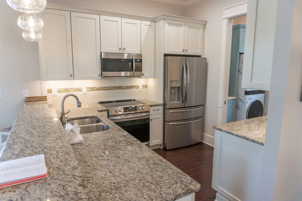 Beautiful, updated kitchen with granite countertops and stainless appliances.