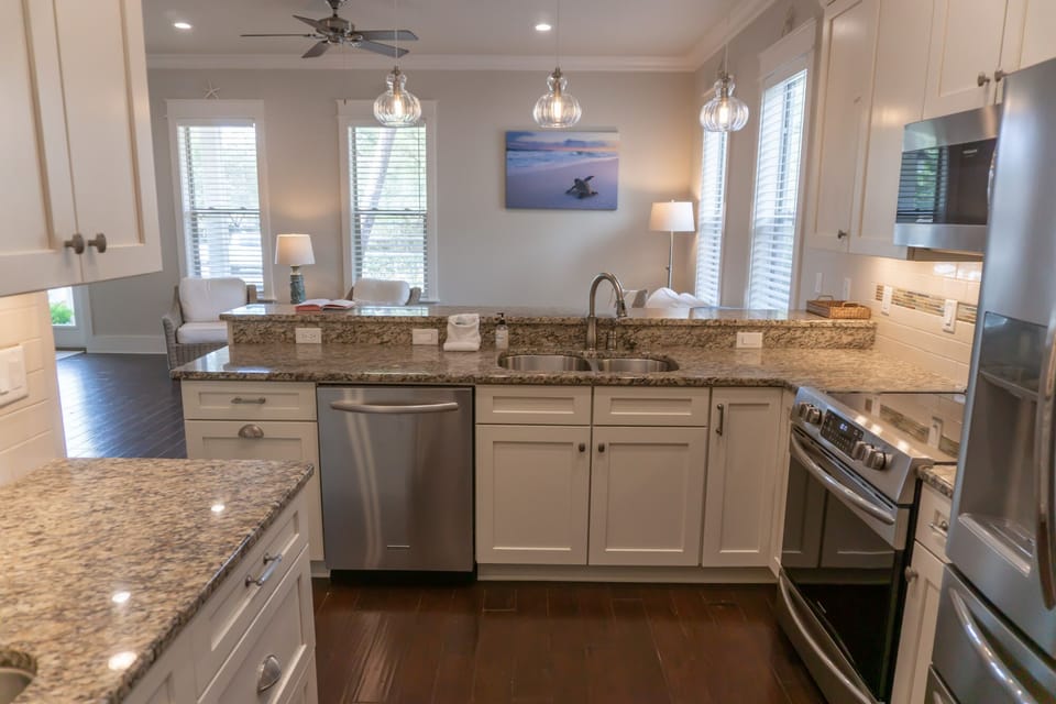View into living room from the kitchen.  This kitchen also has a wet bar.