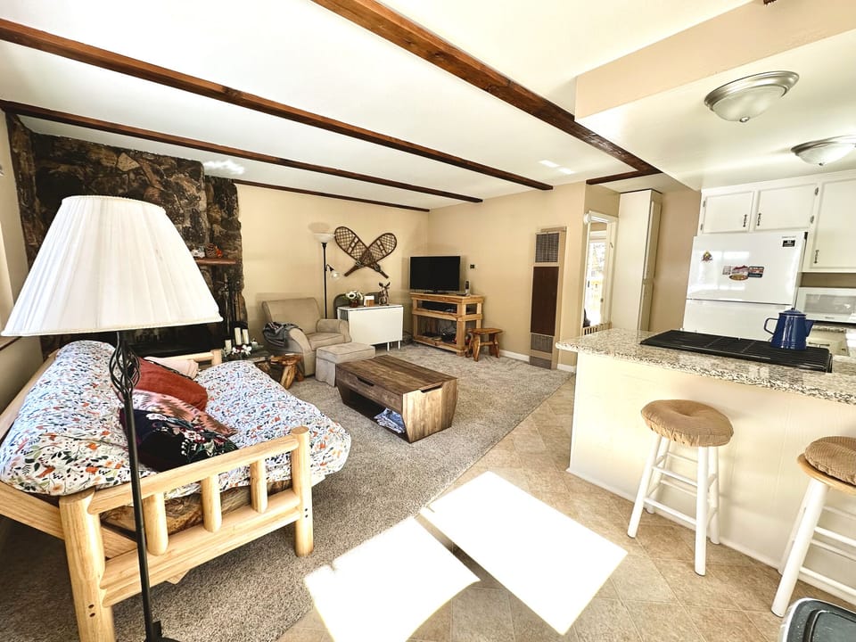 The living room and kitchen are open for a more spacious feel