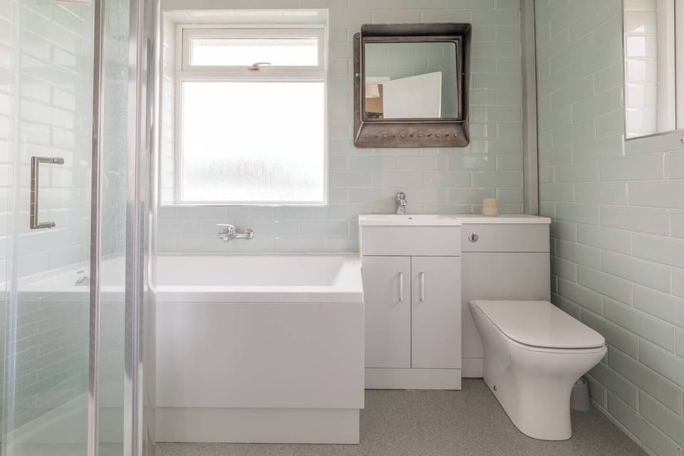 Upstairs family bathroom  with separate shower cubicle