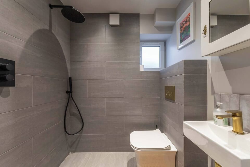 Ground floor shower room with toilet & basin