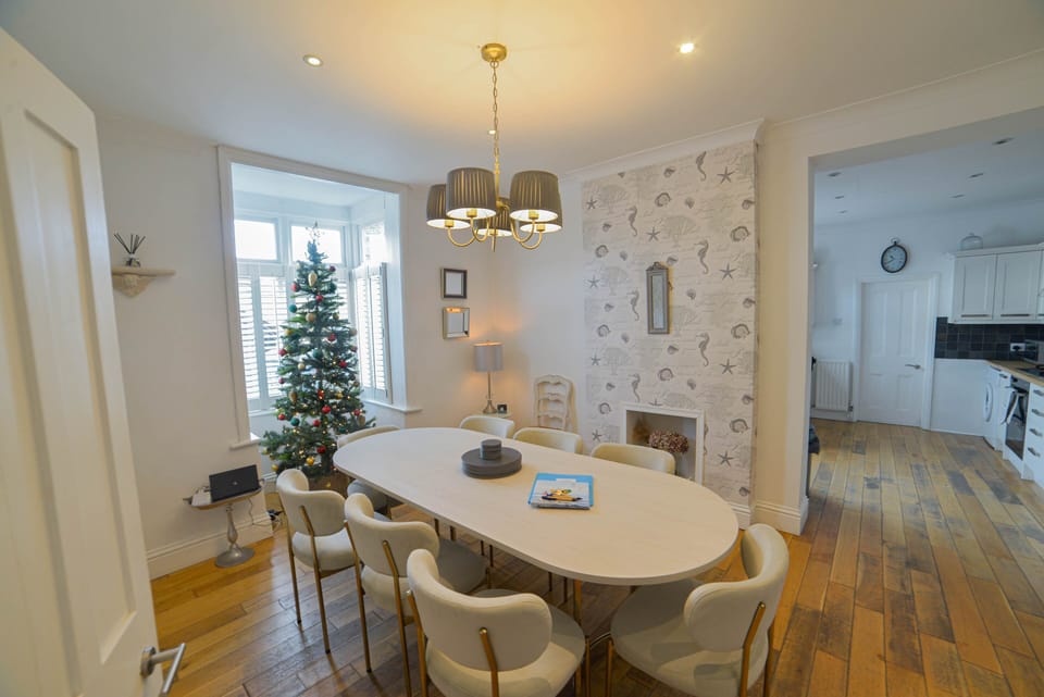 Dining area leading to kitchen