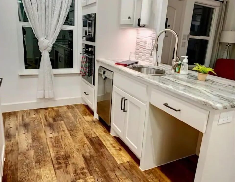kitchen with all new appliances and high end furnishings 