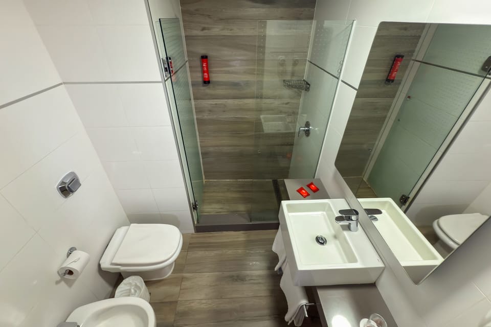 Combined shower/tub, eco-friendly toiletries, hair dryer, towels