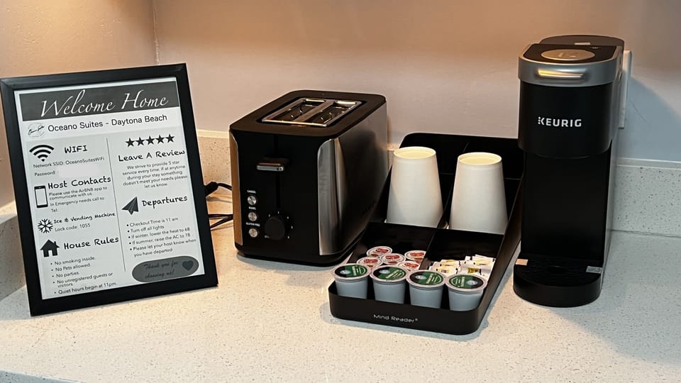 Kitchenette is equipped with mini fridge, microwave, toaster, coffee machine