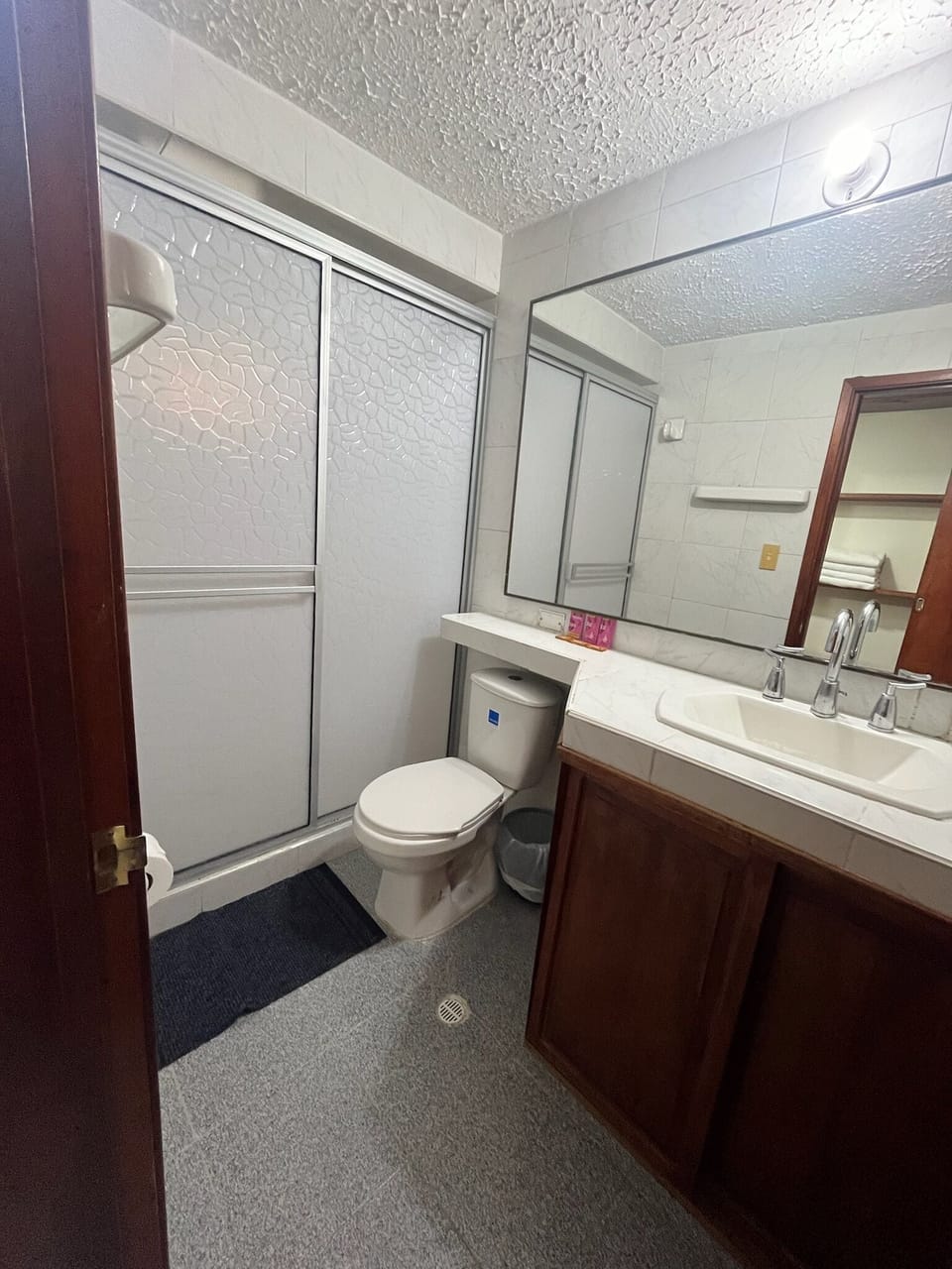 Family Room, 2 Double Beds (Chipazaque) | Bathroom | Shower, towels, soap, shampoo