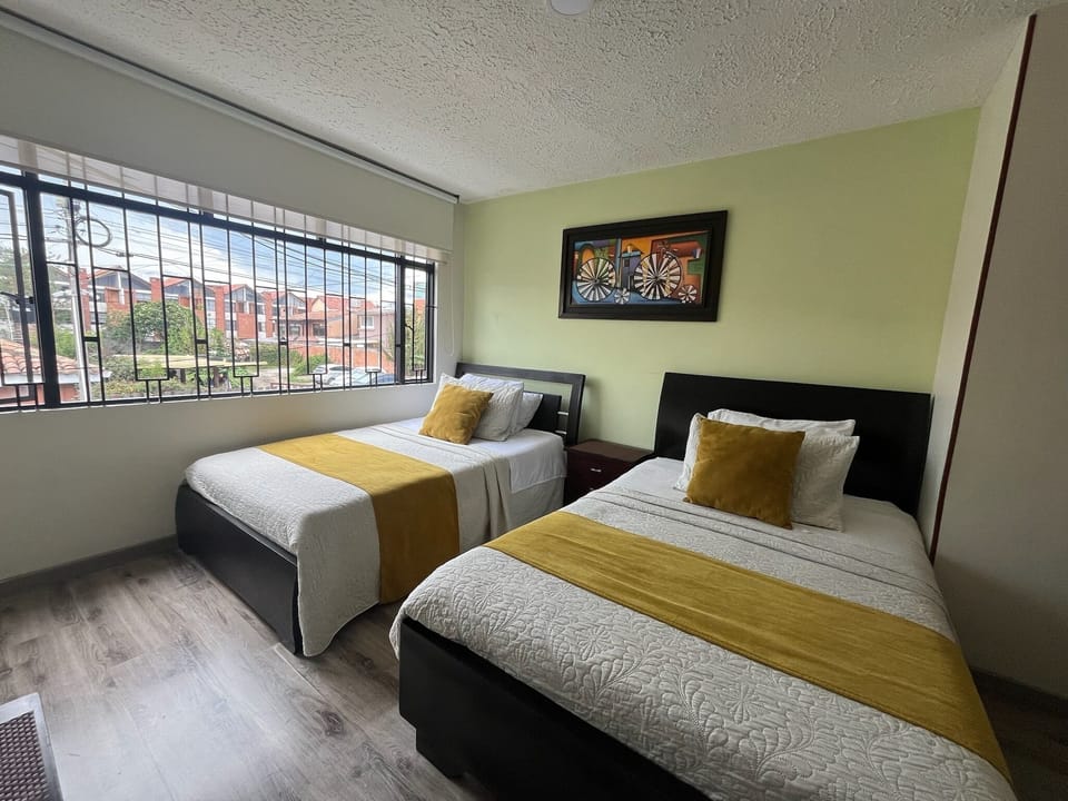 Family Room, 2 Double Beds (Chipazaque) | Desk, laptop workspace, free WiFi, bed sheets