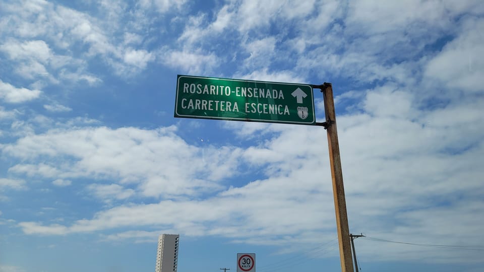 Exit sign for Los Alas Mar y Sol.