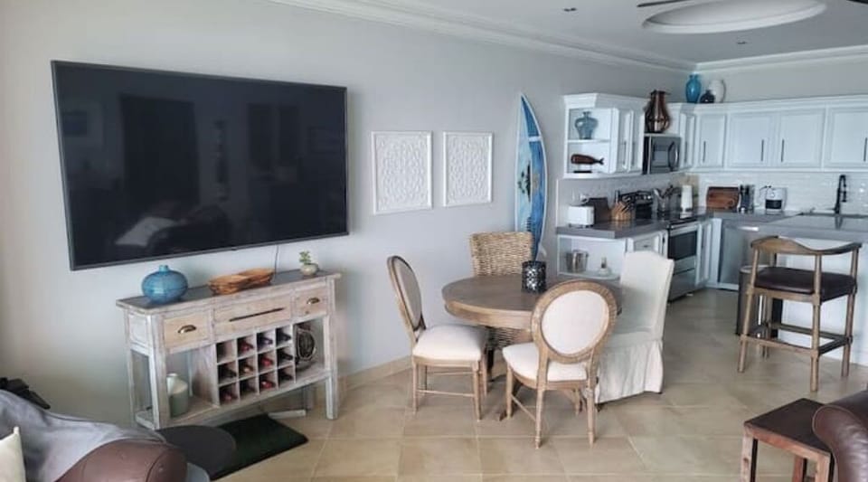 Large 75 inch TV for easy viewing. 