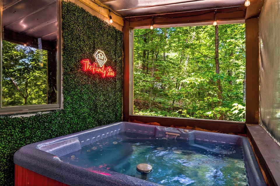 Relax in the secluded hot tub enjoying the lush greenery around you.