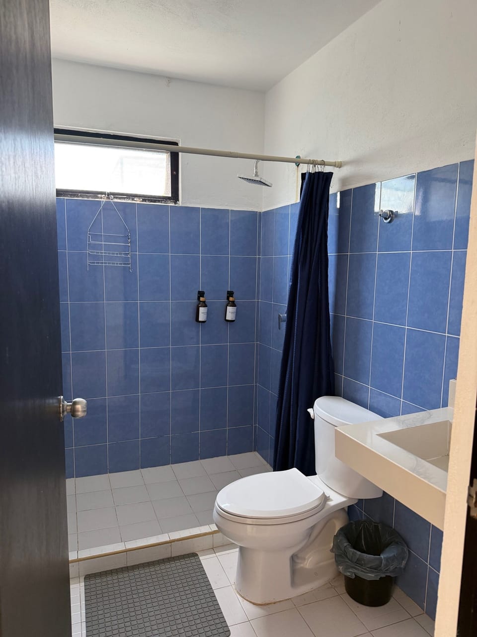 Bathtub, towels, soap, shampoo