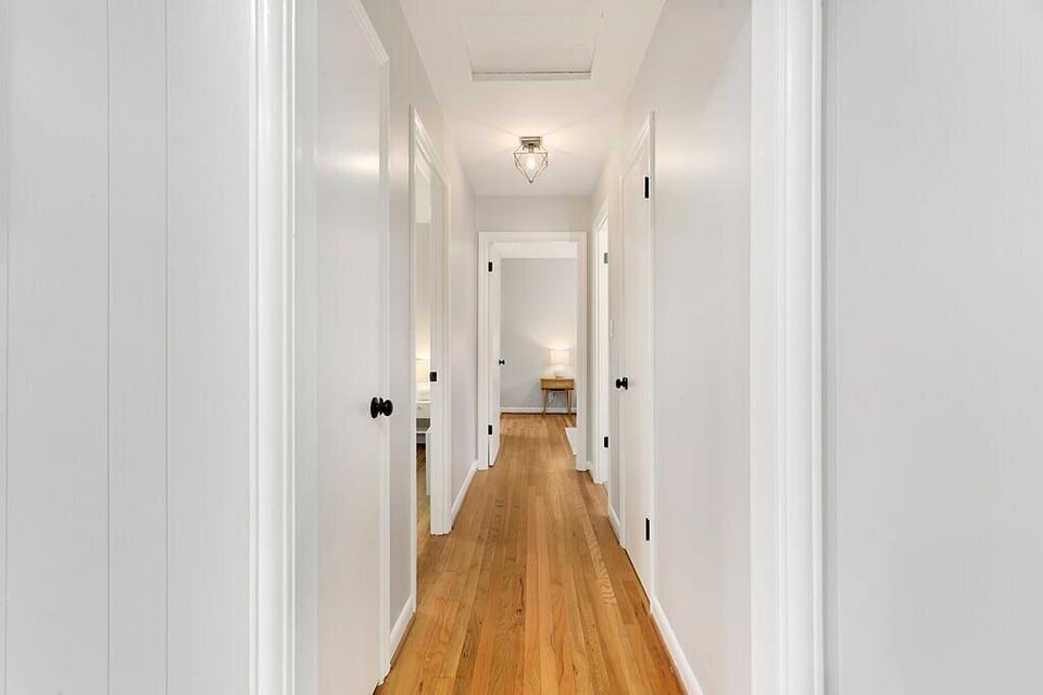 Hardwood floors run throughout — the warmth of the cottage evident in every detail