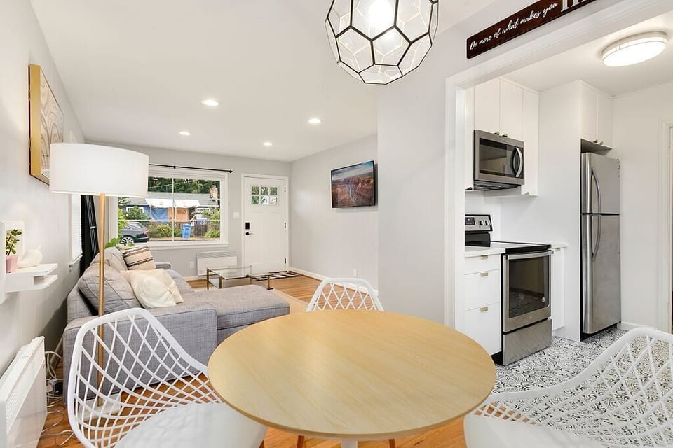 Open plan dining flows seamlessly from the kitchen — great for meals in