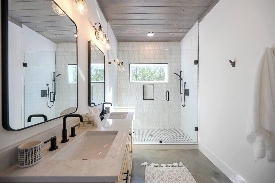 Large ensuite bathroom with double vanity and walk-in shower (bathroom 1)