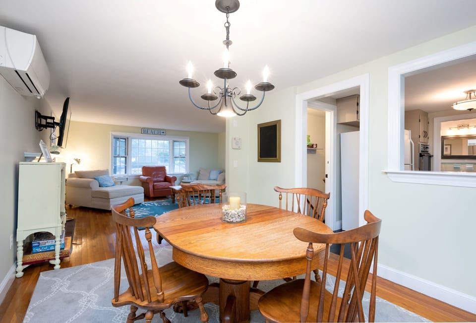 Classic pass-through window between the kitchen and dining room makes service a breeze! - 177 Old Stage Road Centerville Cape Cod - Family Tides - New England Vacation Rentals
