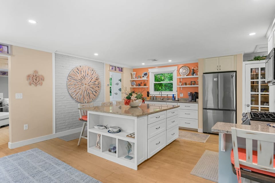 Fully equipped kitchen with granite countertops and stainless steel appliances