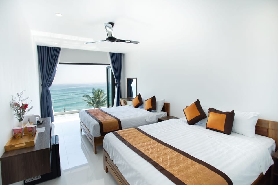 Deluxe Quadruple Room | Premium bedding, minibar, WiFi (free), bed sheets