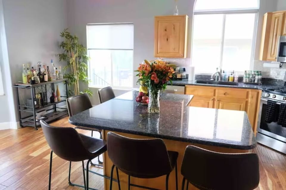 Kitchen (fully stocked) includes seating for 5 around a beautiful island