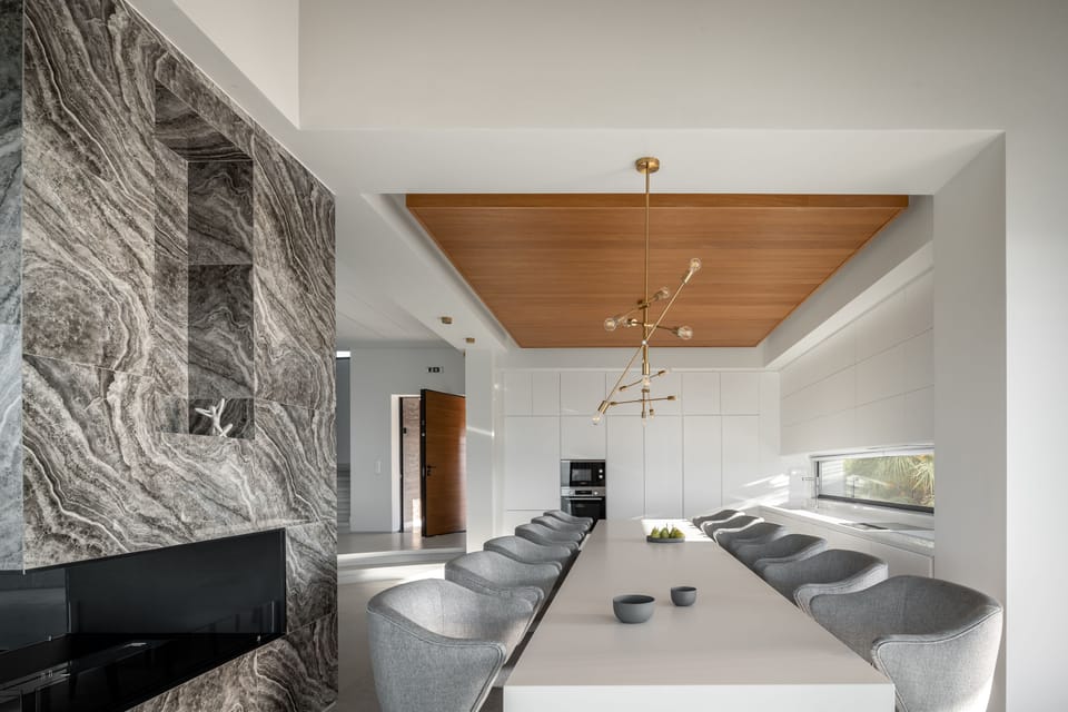 Indoor dining table for 14 guests, adjacent to the kitchen!