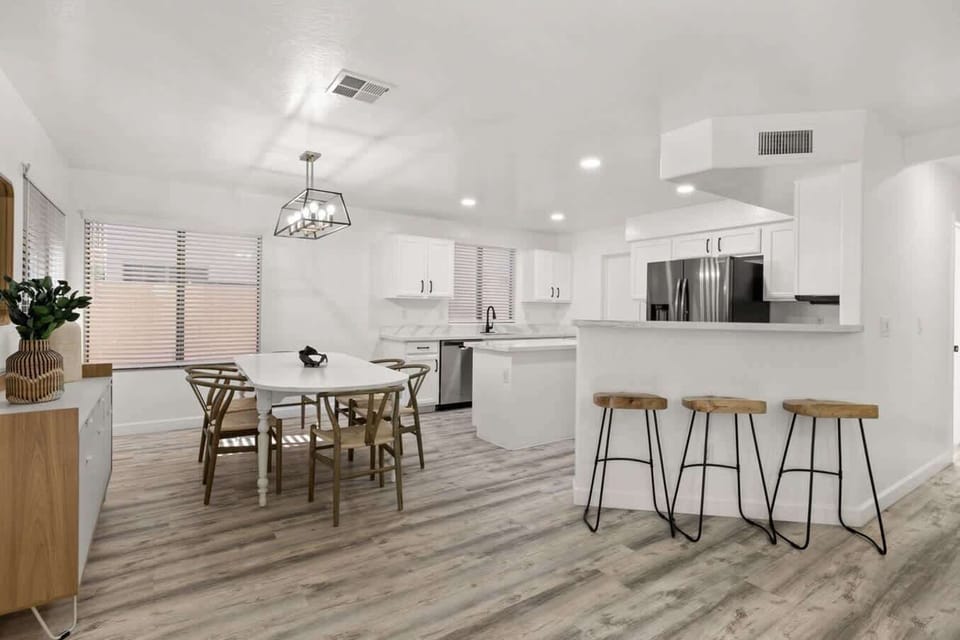 Beautiful kitchen chairs and furnishings add to the styled spaces throughout.