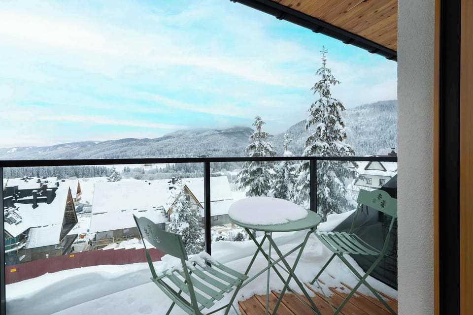 Furnished balcony in a winter setting. 