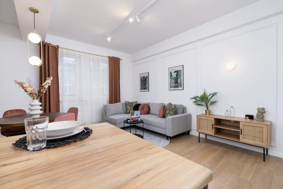 Another angle of the living room showcasing the spacious layout and décor.
