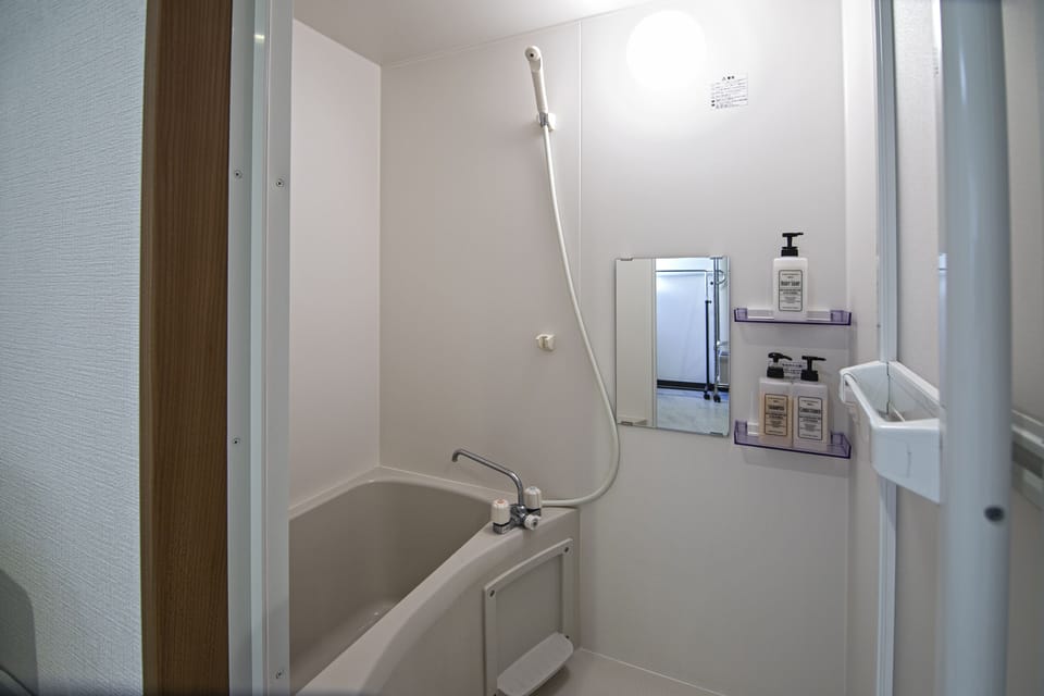 Family House | Bathroom | Separate tub and shower, rainfall showerhead, free toiletries