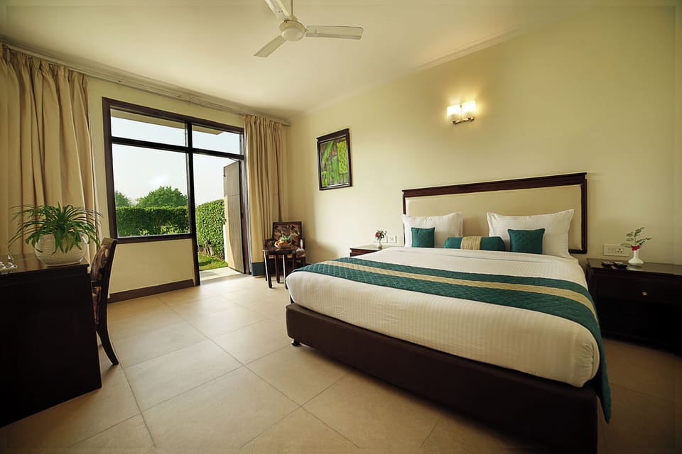 Premium Room with Private Garden | Egyptian cotton sheets, premium bedding, down comforters, in-room safe