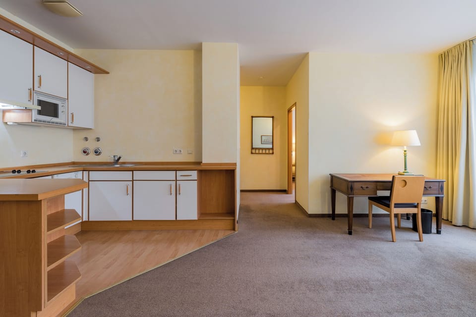 Deluxe Apartment | Private kitchen | Fridge, microwave, stovetop, espresso maker